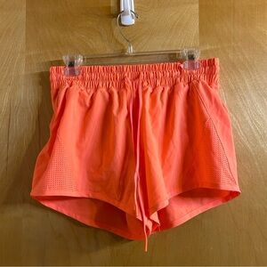Avia women’s running shorts with liner, neon orange size small